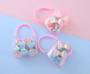 Coffret cadeau rose avec sacs couronne, nœuds pailletés et élastiques pour filles