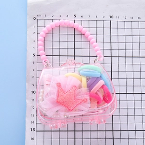Coffret cadeau sac à main couronne rose avec nœuds pailletés et accessoires cheveux