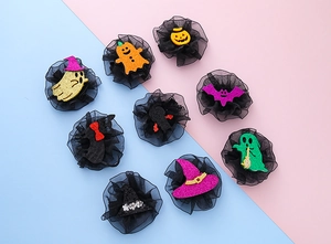 Detailed set of 9 Halloween hair clips including pumpkins, ghosts, and bats for kids