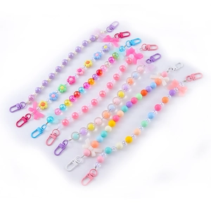 Colorful beaded keychain with sweet bow and flower charms for bags or phones
