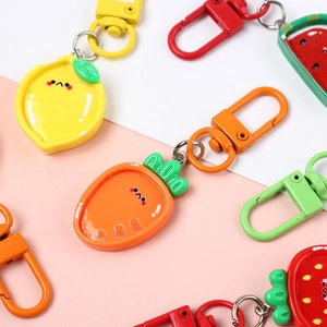 Cute fruit resin keychains featuring watermelon strawberry and lemon for kids bags
