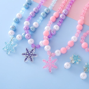 Kids colorful beaded jewelry set with snowflake pendants in pastel blue and pink colors