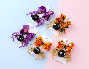 Lot de cinq barrettes d'Halloween avec araignées et rubans orange et violet