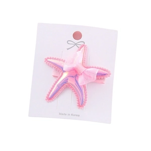 Pink starfish hair clip for girls with shimmering sequins and a delicate mesh bow