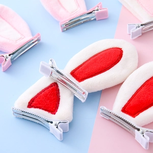 Kawaii plush bunny ear hair clips for kids in white and pink soft fabric styles