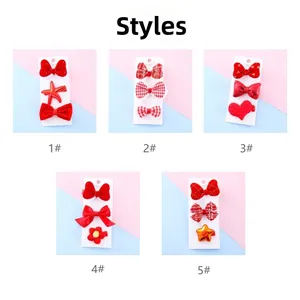 Detailed set of 5 red children's hair clips with bow star and heart shapes