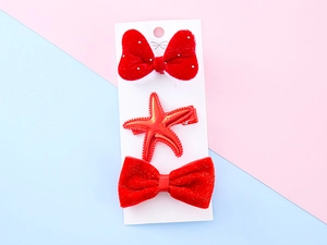 Detailed set of red velvet hair clips with pearls and a starfish for children
