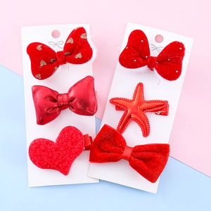 6-piece festive red hair clips set with plush velvet bows and hearts for kids