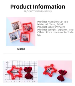 Détail de pince étoile rouge et nœud bordeaux dans un coffret cadeau 9x9x2cm