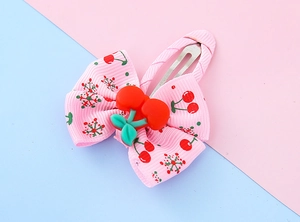 Pink ribbon bow hair clip for girls with cherry patterns and cute resin cherry charm