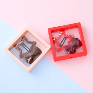 Coffret cadeau de barrettes à cheveux étoile et nœud dans des boîtes de présentation PE