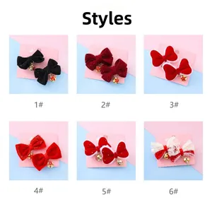 Detail view of six styles of red bow hair clips with flower bell pendants for girls