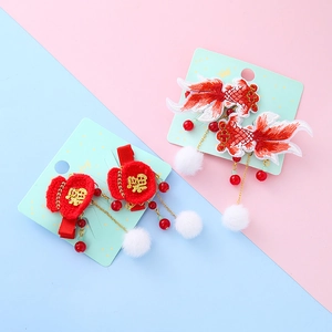 Traditional Chinese New Year red koi fish and lucky bag hair clips with tassels