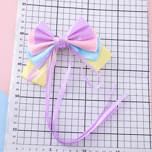 Colorful multi-layer satin bow hair clip with long purple ribbons for girls and women
