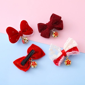 Kids red velvet bow hair clip set with lace details and golden flower bell charms