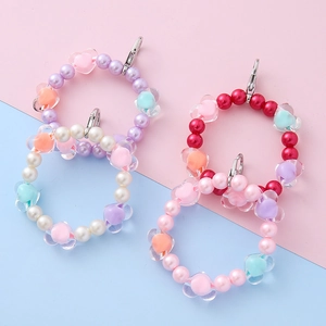 Colorful heart beaded child bracelet with silver metal clasp and faux pearl charms