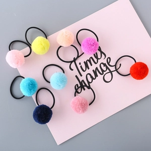 Colorful pom pom hair ties set with high elastic bands in various vibrant candy colors