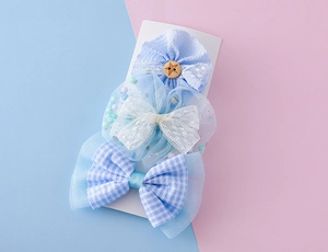 Détail de 3 nœuds papillon bleus pour filles avec dentelle et étoiles sur carte