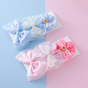 Lot de trois barrettes à cheveux pour filles avec nœuds en résille bleus et roses
