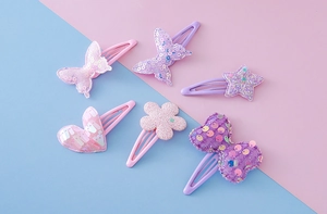 Detail-Set Kinder-Haarclips aus Glitzerstoff mit rosa Schmetterlings- und Sternenformen