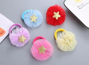 Detail of five-piece colorful mesh star hair ties for children in soft pastel tones