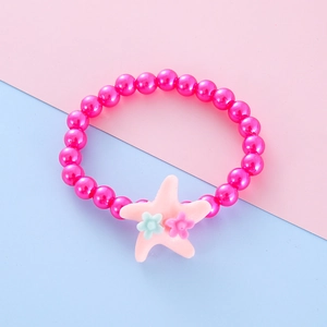 Detailed view of beaded bracelet with rose red beads and pink starfish floral pendant