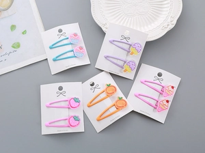 Détail de 5 paires de barrettes colorées pour enfants avec mignons motifs 3D en résine