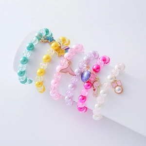 Set of 6 colorful pearl beaded bracelets for kids with seahorse and starfish charms