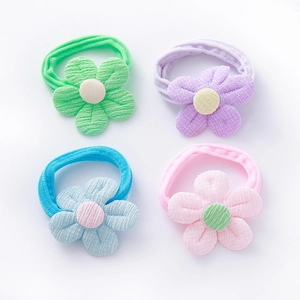 Lot de quatre chouchous fleurs élastiques aux tons pastels macaron pour les enfants