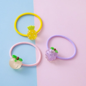 Three-piece set of cartoon fruit hair ties including pineapple grape and peach designs