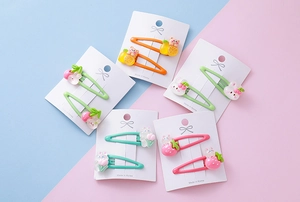 Close-up of cute cartoon resin animal hair clips in various colors for children