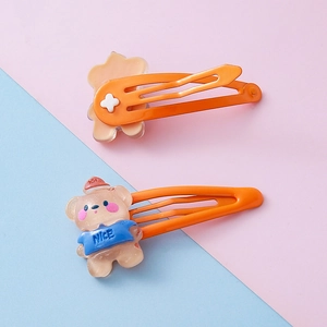 Cute cartoon bear resin hair clips for girls featuring a bright orange metal BB clip base