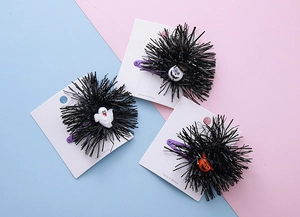 Three Halloween hair clips set featuring ghost, pumpkin, and skull on purple clips