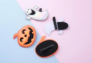 Détail des barrettes Halloween citrouille et fantôme avec pince crocodile en métal