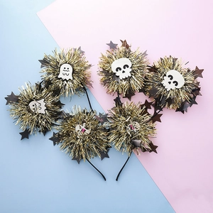 Halloween headband with skull, ghost patches and golden pom-poms for party decoration