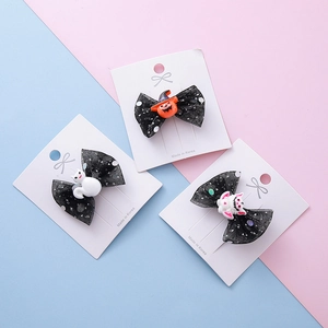 Barrettes Halloween avec nœud en maille pailletée et charms dessin animé citrouille