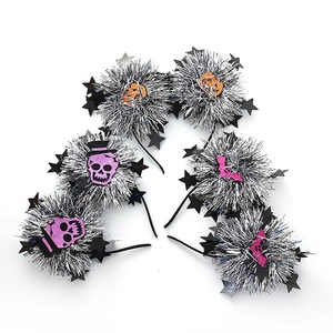 Set of 6 Halloween headbands with glittery pumpkin, skull, and bat motifs on silver pom-poms