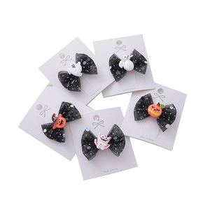 Lot de 5 barrettes d'Halloween avec nœuds à paillettes et motifs fantômes citrouille