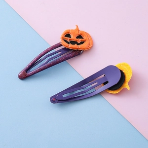 Barrettes Halloween violettes scintillantes avec motif citrouille pour filles