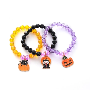 Halloween beaded bracelet set with pumpkin, black cat, and vampire charms for kids