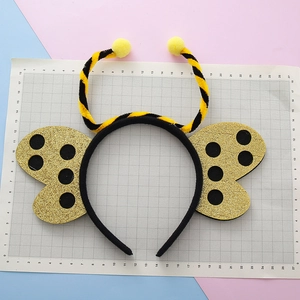 Cerchietto a coccinella per bambini con pompon gialli e ali glitterate carine
