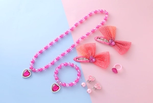 Pink beaded necklace and bracelet set with heart pendant and mesh bow hair clips for kids