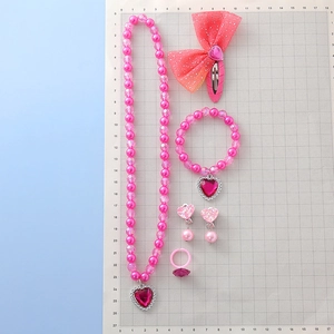 Pink heart jewelry set for girls with pearl necklace, bracelet, earrings and bow hair clip