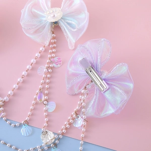 Mermaid style bow hair clips with pearls and shell tassels for girls' princess hairstyle