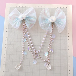 Iridescent bow hair clips with pearl tassels and shell charms for girl princess hair