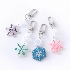 Cute Frozen-style snowflake keychain set with colorful translucent beads and metal lobster clasps