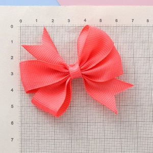 Barrette nœud rose corail en ruban gros-grain pour fille, taille 7,5cm sur une règle