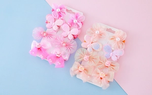 Détail de pinces à cheveux en dentelle florale pour enfants avec perles et lapins mignons