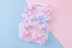 Détail de l'ensemble de 8 pinces à cheveux pour filles avec fleurs et perles
