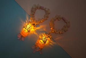 Luminous scrunchies with hollow metal lanterns and Fu character charm details